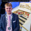 Oscar Battle seated at the 3/12 Musical Museum Wurlizter shortly after having won the title. 
